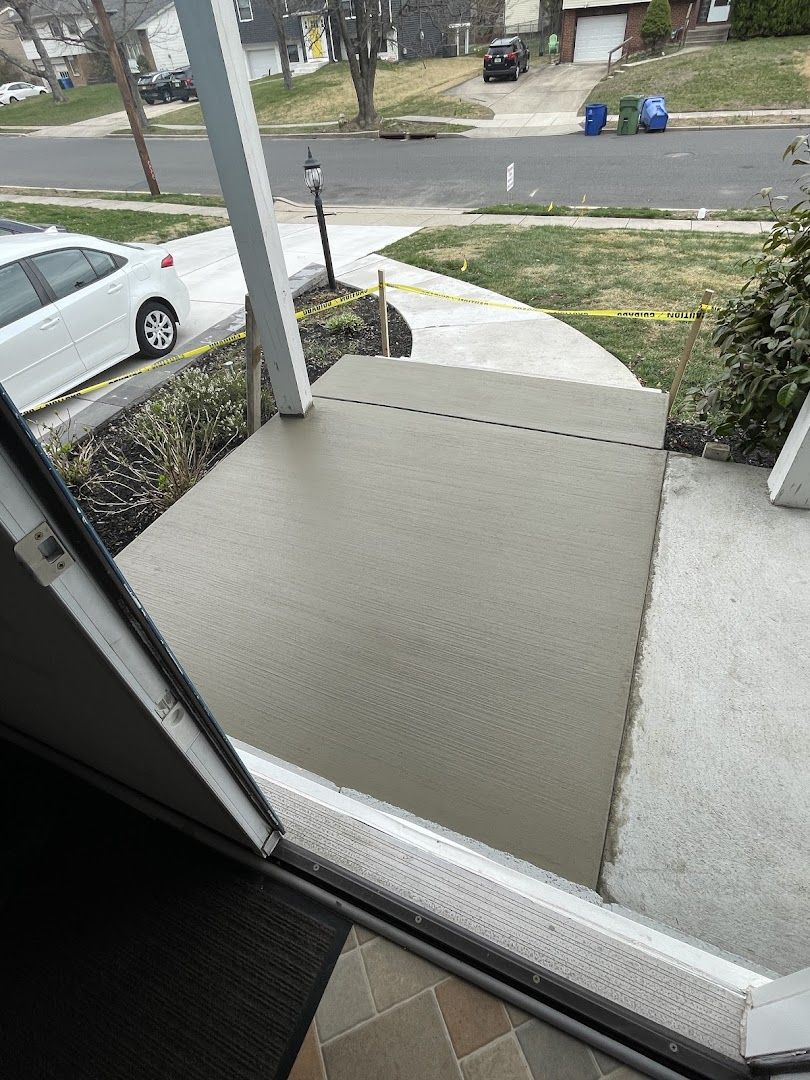 Detail of clean poured concrete steps and slab